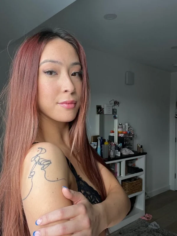 Ashleychung on OnlyFans Ashleychung OnlyFans red hair tattooed