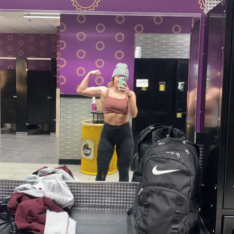 AJ OnlyFans Profile AJ OnlyFans creator showcasing her muscles