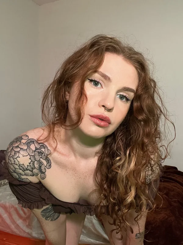Frecklefox OnlyFans creator with vibrant red hair