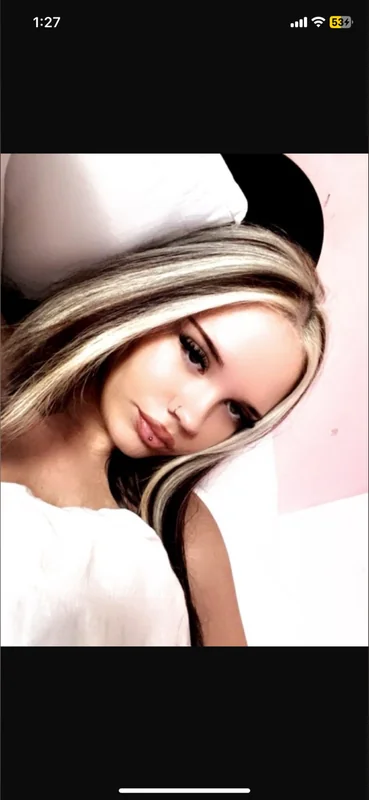 Molls OnlyFans creator with blonde hair