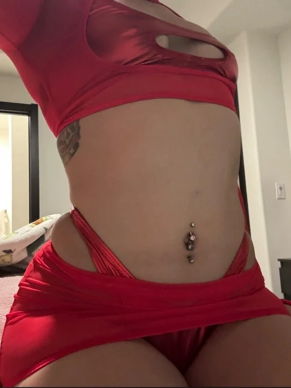 Tesla OnlyFans creator with tattoos and piercings